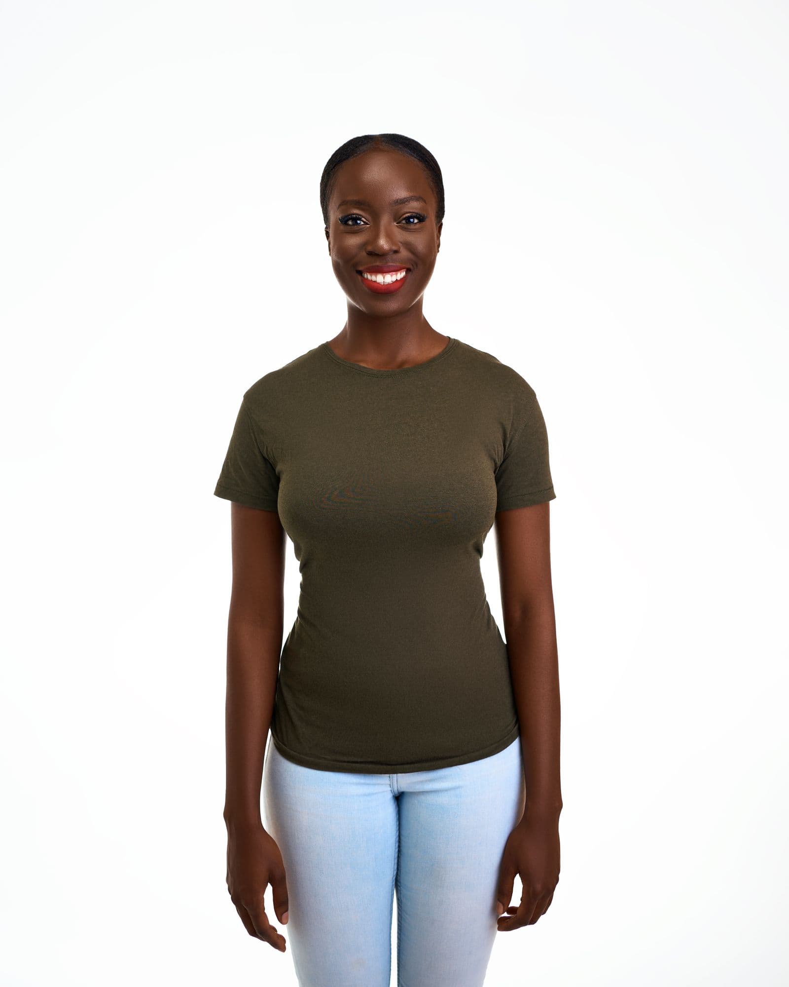 A confident woman with a bright, healthy smile