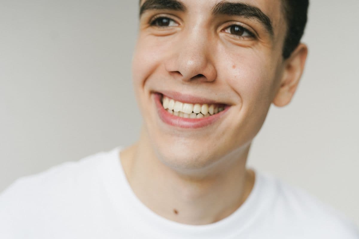 A man with a natural, healthy smile