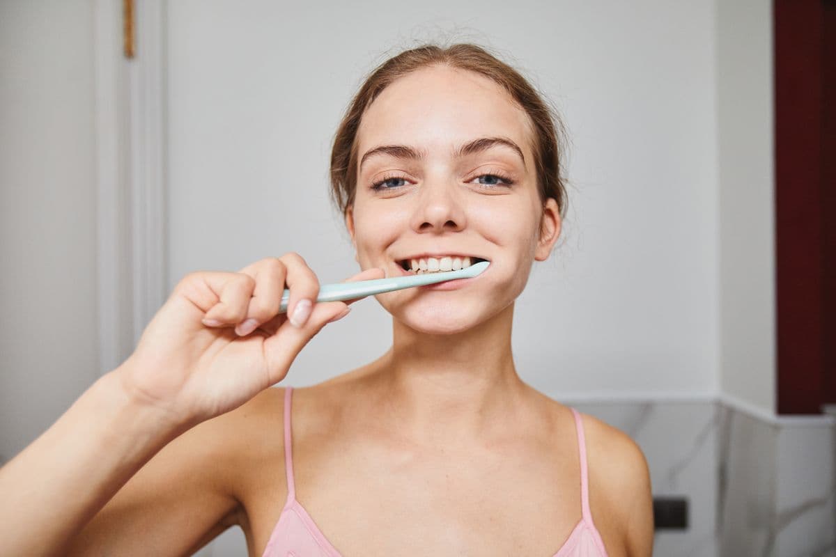 A smiling patient at a friendly dental checkup